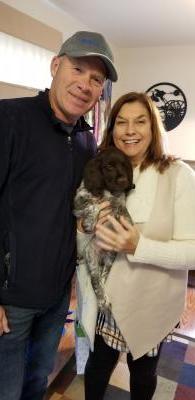Patti and Philp from Wisconsin with there male puppy Ace (Blue Collar). His call name is Dakota Patti and Philp from Wisconsin with there male puppy Ace (Blue Collar). His call name is Dakota