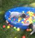 Mr Purple in the ball pit ready to pounce